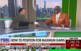 Chris McMahon and Charles Payne shaking hands